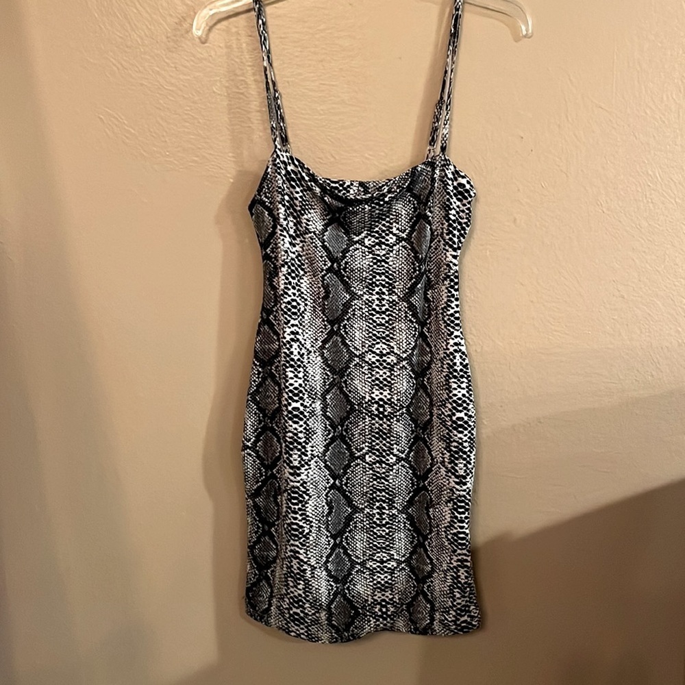 Black and white snake skin mini dress by Salty